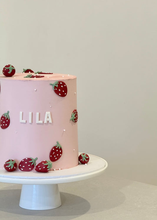 Lila strawberry cake side view with buttercream detail — handcrafted by Bakeology Studios Melbourne