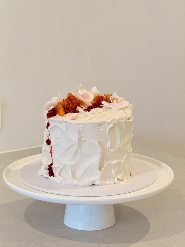 Clementine rustic buttercream cake with fresh florals — what a wedding cake costs in Melbourne, Bakeology Studios