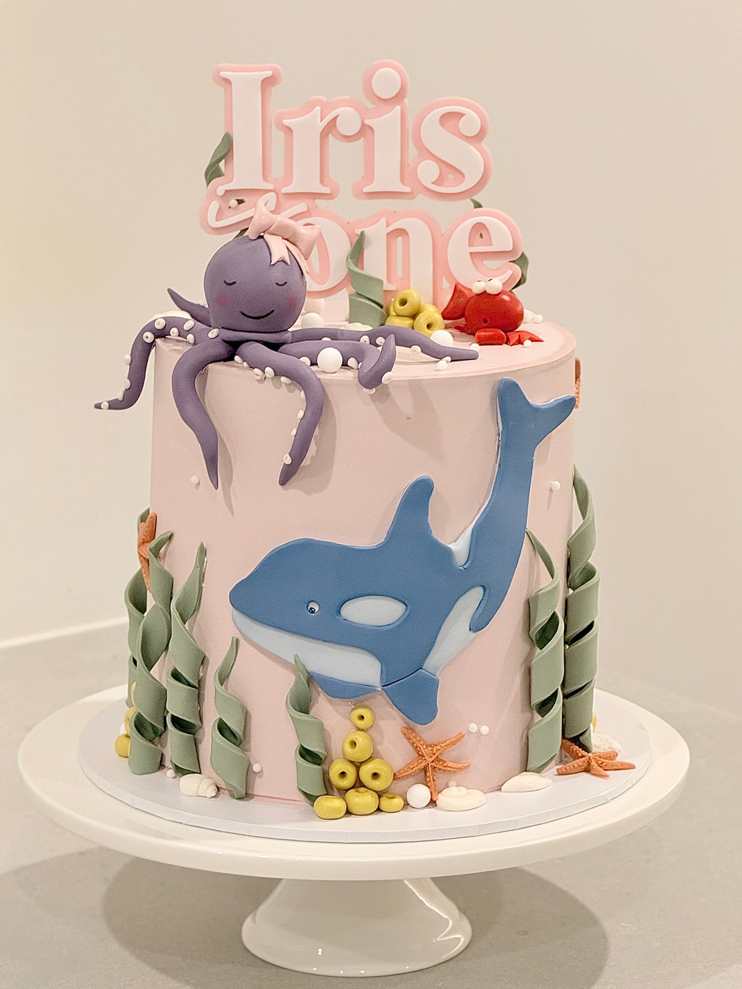 Iris close-up — hand-sculpted lavender octopus and pastel ocean detail, handcrafted in Burwood East Melbourne