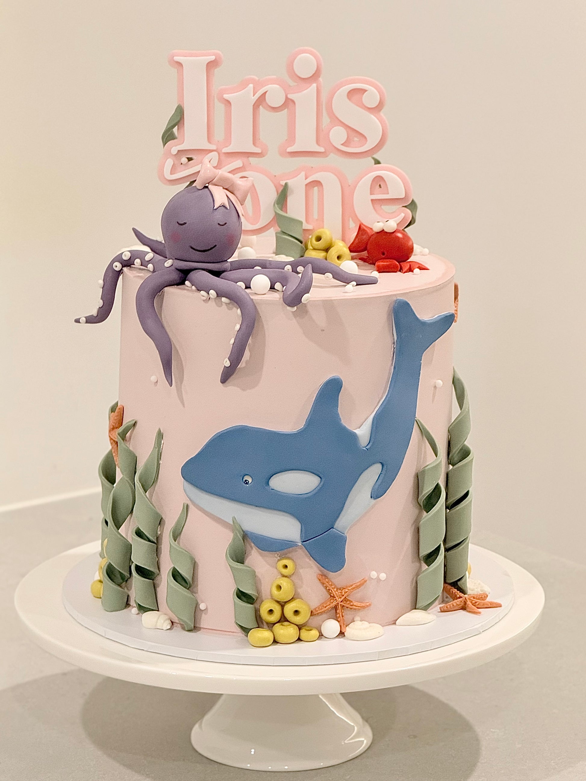 Iris close-up — hand-sculpted lavender octopus and pastel ocean detail, handcrafted in Burwood East Melbourne