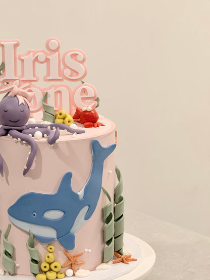 Iris under-the-sea cake with sculpted whale and octopus figurines — Bakeology Studios Melbourne