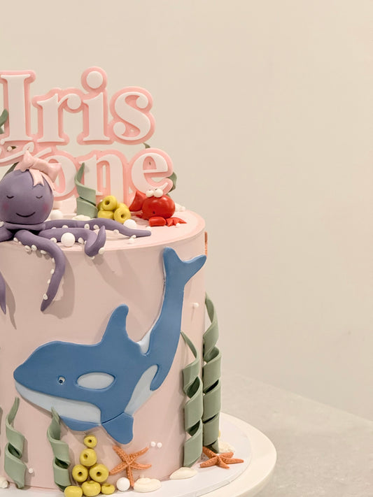 Iris under-the-sea cake with sculpted whale and octopus figurines — Bakeology Studios Melbourne