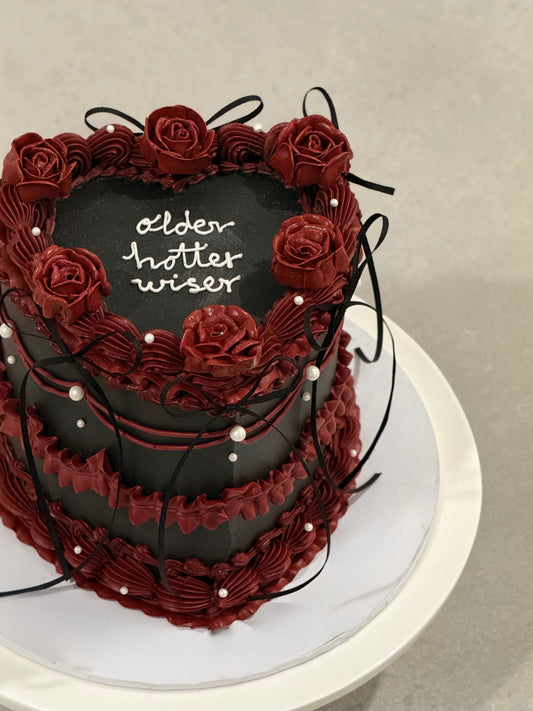 Colette dark elegant birthday cake side view with burgundy rose detail — Bakeology Studios Melbourne