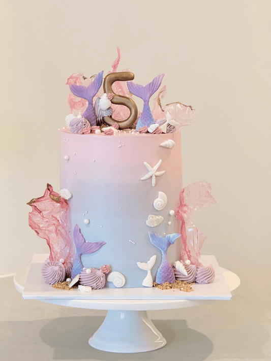 Mariana coastal celebration cake in dreamy pastels with pearls and ocean treasures — Bakeology Studios Melbourne