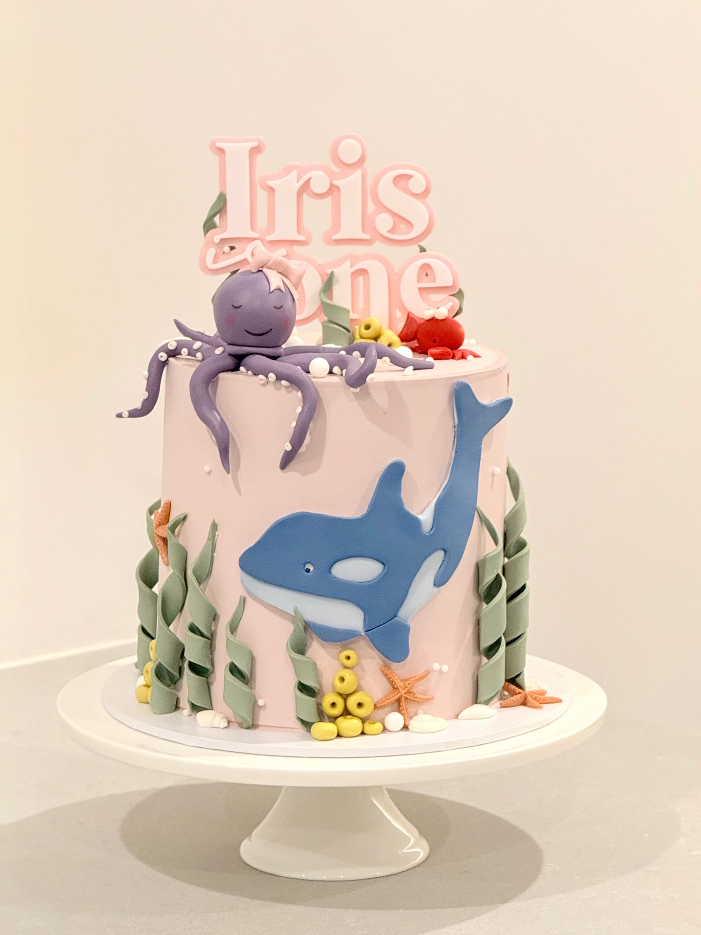 Iris pastel ocean kids birthday cake with sleepy lavender octopus topper — Bakeology Studios Melbourne