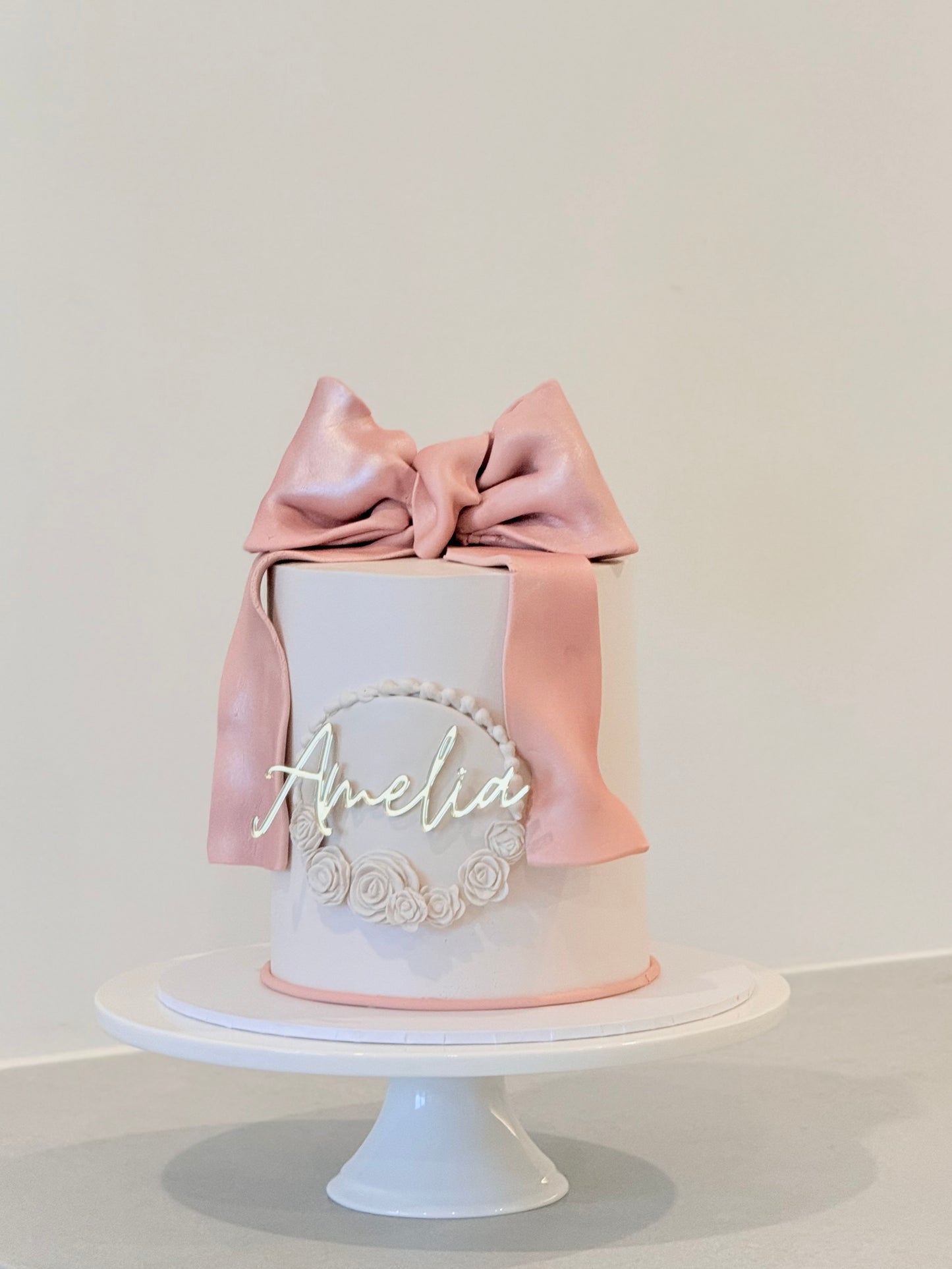 Amelia blush satin ribbon celebration cake with delicate buttercream florals — Bakeology Studios Melbourne