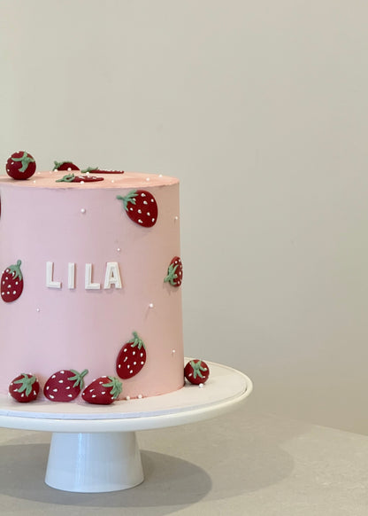 Lila strawberry cake side view with buttercream detail — handcrafted by Bakeology Studios Melbourne