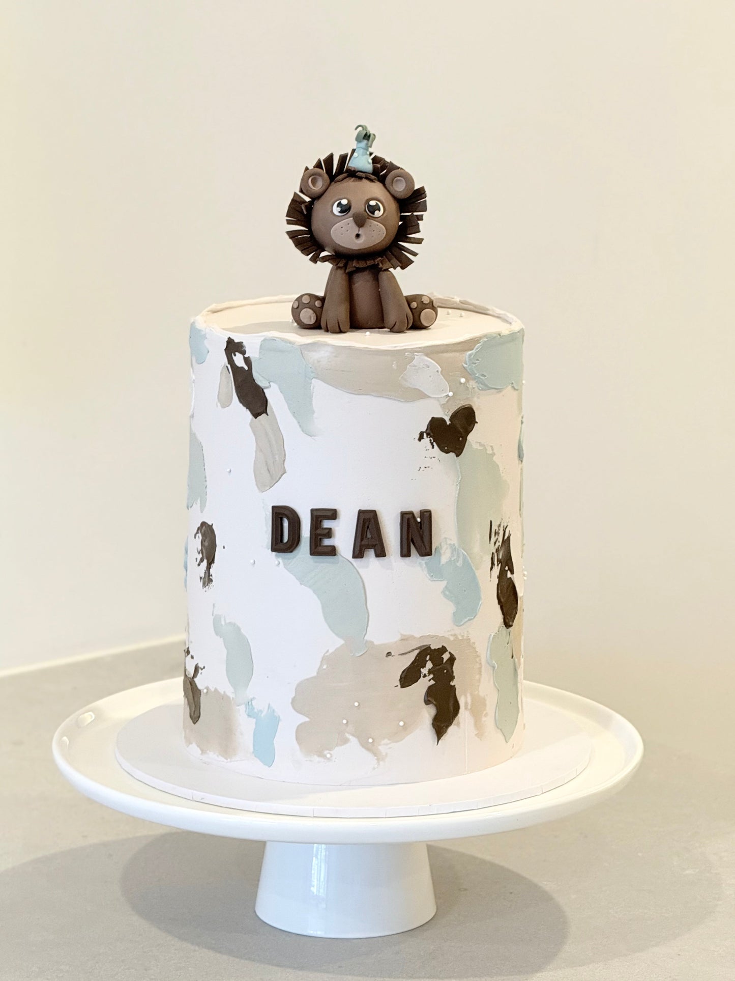 Dean — handcrafted kids birthday cake with lion figurine topper, Melbourne — Bakeology Studios
