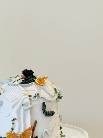 Elowen editorial luxury celebration cake with dried fruit and botanical styling — handcrafted by Bakeology Studios Melbourne