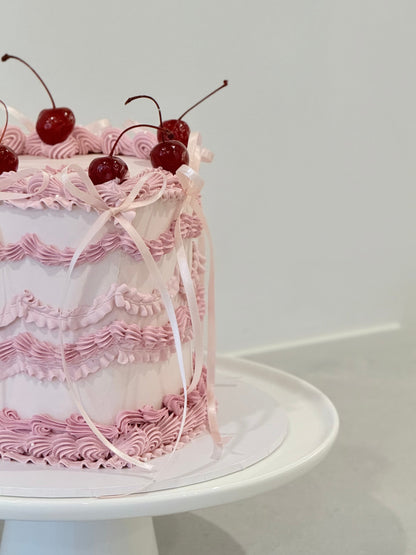 Lola ballet-inspired pink ruffle cherry celebration cake — custom handcrafted Melbourne Bakeology Studios