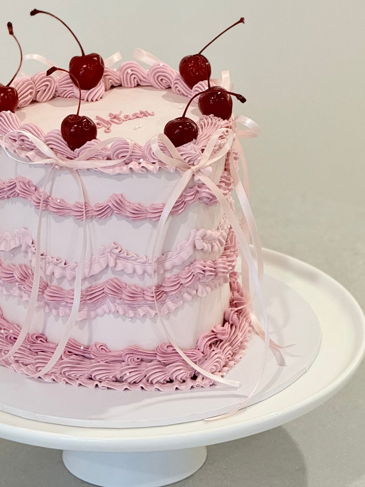 Lola close-up detail — layered pink Lambeth ruffle piping handcrafted Bakeology Studios Burwood East