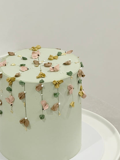 Etta floral cake detail — delicate buttercream flowers Melbourne studio