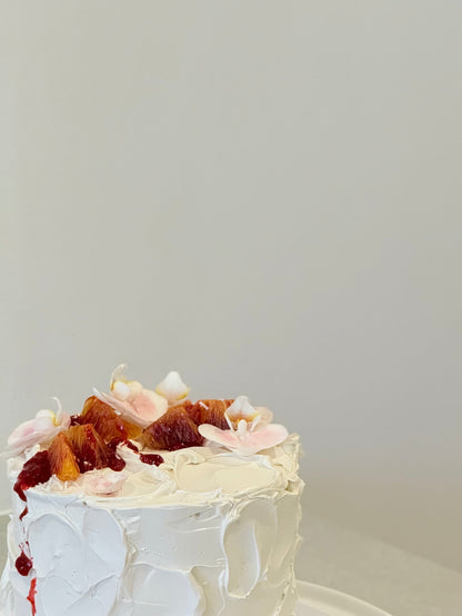 Close-up detail of rustic floral birthday cake with organic buttercream swirls — Bakeology Studios Melbourne