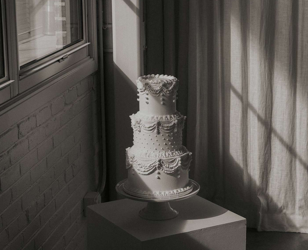 Elegant custom wedding cake handcrafted by Bakeology Studios Melbourne